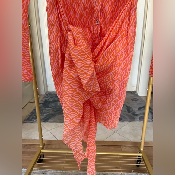 Never worn- Free People button up dress with ties/fabric detail on skirt. - Picture 3 of 4